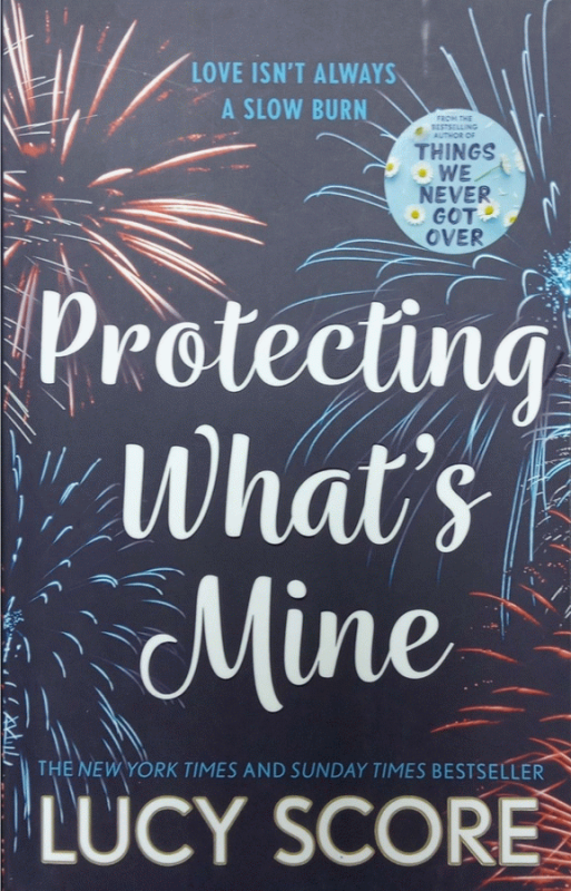 Protecting What’s Mine : a small town love story / Lucy Score.